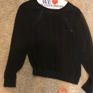 Cache black dressy top with see thru sleeves